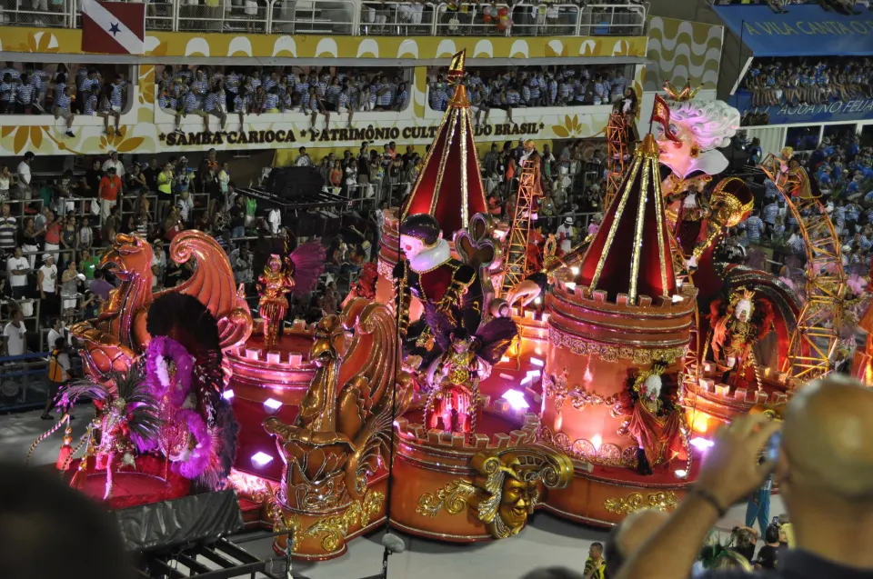 Illuminated samba school float parading through the Sambadrome during Rio Carnival