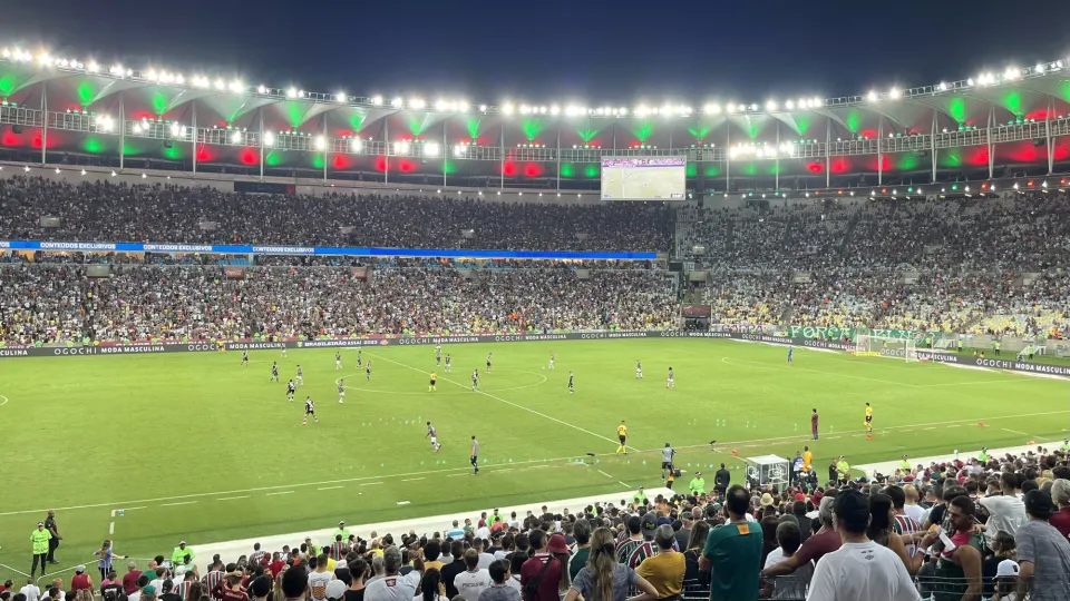 Packed Maracanã stadium under floodlights during a Fluminense versus Vasco football match